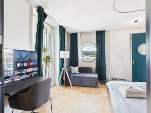 Postel nebo postele na pokoji v ubytování modernes Studio an bester Lage