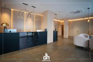 Postel nebo postele na pokoji v ubytování DREAM HOTEL SARANDA