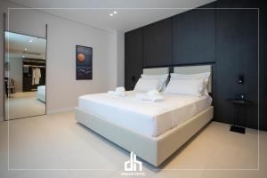 Postel nebo postele na pokoji v ubytování DREAM HOTEL SARANDA