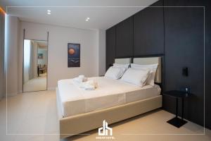 Postel nebo postele na pokoji v ubytování DREAM HOTEL SARANDA