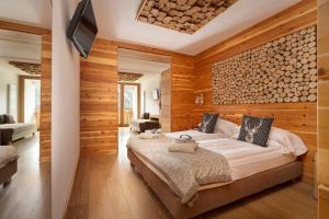 Ένα ή περισσότερα κρεβάτια σε δωμάτιο στο Hotel Dahu