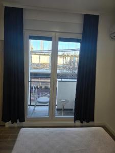Postel nebo postele na pokoji v ubytování Kmb Apartment