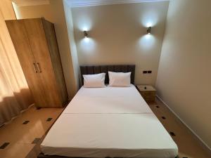Postel nebo postele na pokoji v ubytování Vila Diora Hostel