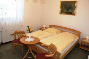 Postel nebo postele na pokoji v ubytování Barokk Hotel + 23 fotografií