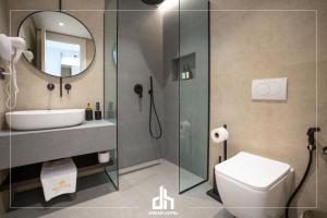 Koupelna v ubytování DREAM HOTEL SARANDA