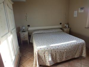 Posteľ alebo postele v izbe v ubytovaní Agriturismo San Martino