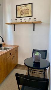 a kitchen with a table with a bowl on it at El Callejón DEPARTAMENTO in Real de Catorce