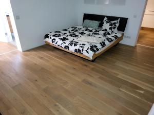 Ένα ή περισσότερα κρεβάτια σε δωμάτιο στο Modernes & luxuriöses Apartment in Nähe der WHU
