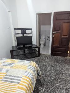 En eller flere senger på et rom på Céntrico y cómodo Apartamento en Danlí