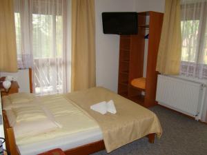 Krevet ili kreveti u jedinici u objektu Willa Stenia Apartamenty
