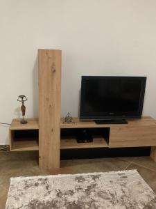 TV a/nebo společenská místnost v ubytování Podgorica city center apartment + 23 fotografií