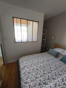 Postel nebo postele na pokoji v ubytování L'abysse - Appartement indépendant