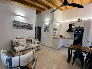 a living room with a couch and a table at Panorama Suite in Ávila