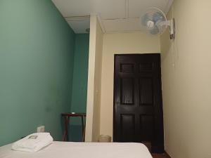 Postelja oz. postelje v sobi nastanitve BlueRock Hostal