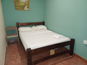 Postelja oz. postelje v sobi nastanitve BlueRock Hostal