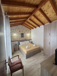 Postel nebo postele na pokoji v ubytování Villa Mitsialis