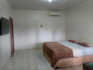 Postel nebo postele na pokoji v ubytování Casa para Cop 30 + 16 fotografií