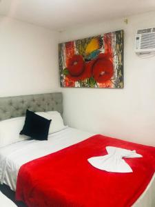 Postel nebo postele na pokoji v ubytování Hotel Altos del Prado