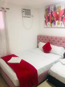 Postel nebo postele na pokoji v ubytování Hotel Altos del Prado