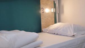 Postel nebo postele na pokoji v ubytování Sunshine Hostel Palermo