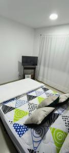 Postel nebo postele na pokoji v ubytování Alojamiento Casa Naranja