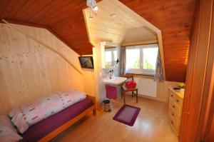 Ein Bett oder Betten in einem Zimmer der Unterkunft Gasthaus Waldheim