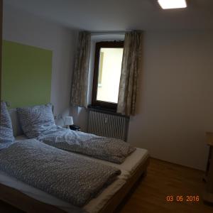 Ein Bett oder Betten in einem Zimmer der Unterkunft Hotel Einstein