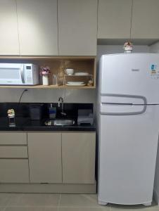 Η κουζίνα ή μικρή κουζίνα στο Apartamento, Studio, Loft - GO Rio Branco, próximo HCPA e HPS