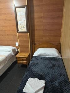 Ένα ή περισσότερα κρεβάτια σε δωμάτιο στο Hotel Don Jose