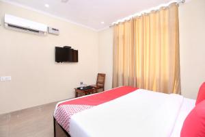 TV a/nebo společenská místnost v ubytování Hotel O Sky