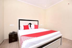 Postel nebo postele na pokoji v ubytování Hotel O Sky
