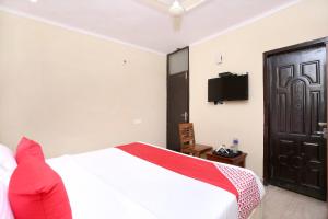 Postel nebo postele na pokoji v ubytování Hotel O Sky