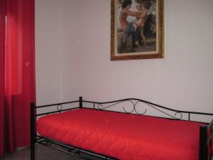 Posteľ alebo postele v izbe v ubytovaní Palinuro casa vacanze "Donna Antonia"