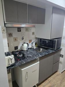 Kuchyň nebo kuchyňský kout v ubytování AMueblados GRANERO