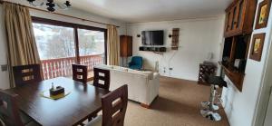 Posezení v ubytování Apartamento Termas de Chillán + 32 fotografií