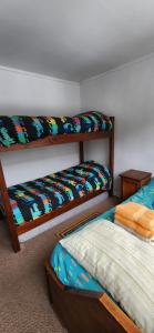 Postel nebo postele na pokoji v ubytování Apartamento Termas de Chillán