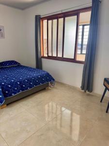 Postel nebo postele na pokoji v ubytování Apartamento con terraza privada y jacuzzi