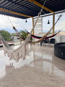 Posezení v ubytování Apartamento con terraza privada y jacuzzi