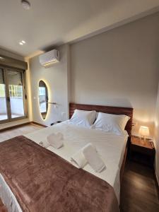 Postel nebo postele na pokoji v ubytování SOLs Center Rooms