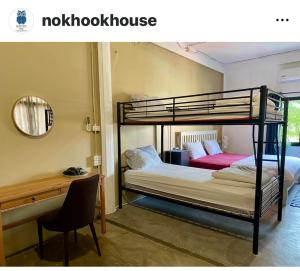 Postel nebo postele na pokoji v ubytování Nokhook House