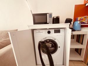 TV a/nebo společenská místnost v ubytování Rose des Sables - Palavas