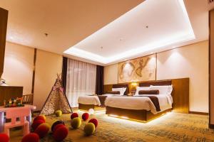 Una cama o camas en una habitación de James Joyce Coffetel Changchun People's Square 261 fotos más