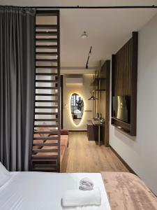 Postel nebo postele na pokoji v ubytování SOLs Center Rooms