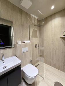 Koupelna v ubytování SOLs Center Rooms