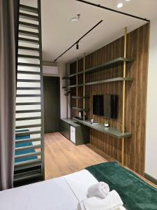 TV a/nebo společenská místnost v ubytování SOLs Center Rooms