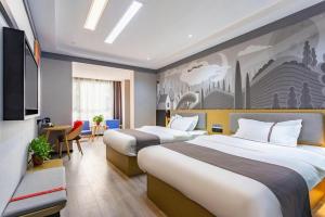 TV a/nebo společenská místnost v ubytování Thank Inn Henan Zhoukou Chuanhui District Zhoukou Avenue Municipal Government