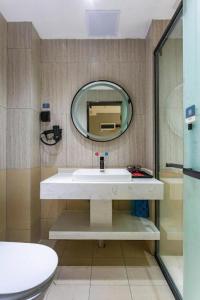 Koupelna v ubytování Thank Inn Henan Zhoukou Chuanhui District Zhoukou Avenue Municipal Government