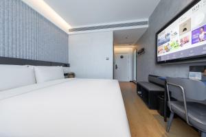 Μια τηλεόραση ή/και κέντρο ψυχαγωγίας στο Atour Light Hotel Beijing Zhongguancun Renmin University