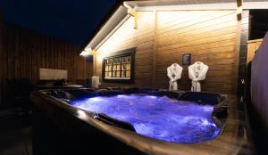 a large jacuzzi tub in a room at St Hildas Complex in Hinderwell