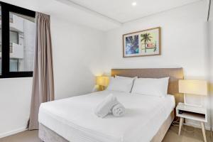 Letto o letti in una camera di Breeze 801